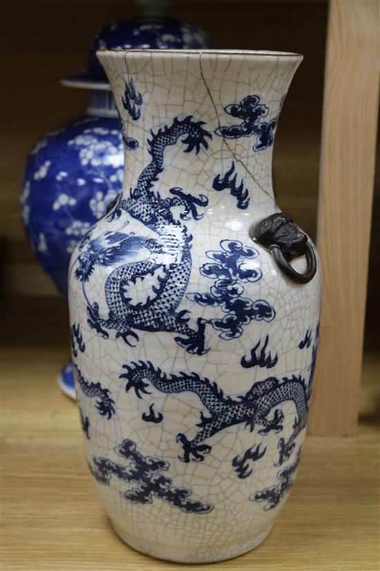 A large 19th century Chinese blue and white vase and cover and a crackle glaze dragon vase tallest 42cm